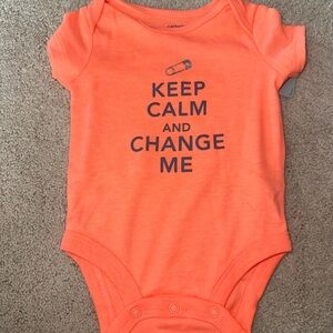 Brand new peach/ orange onesie